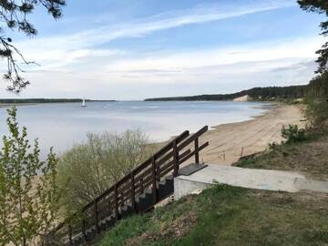 Фото номера Дом с 2 спальнями Дома для отпуска River Side House г. Vārnu Krogs 52