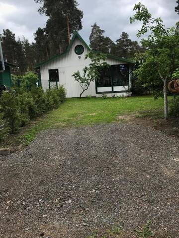 Фото номера Дом с 2 спальнями Дома для отпуска River Side House г. Vārnu Krogs 68