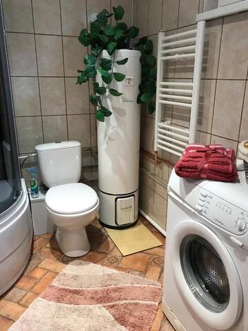 Фото номера Дом с 2 спальнями Дома для отпуска River Side House г. Vārnu Krogs 10